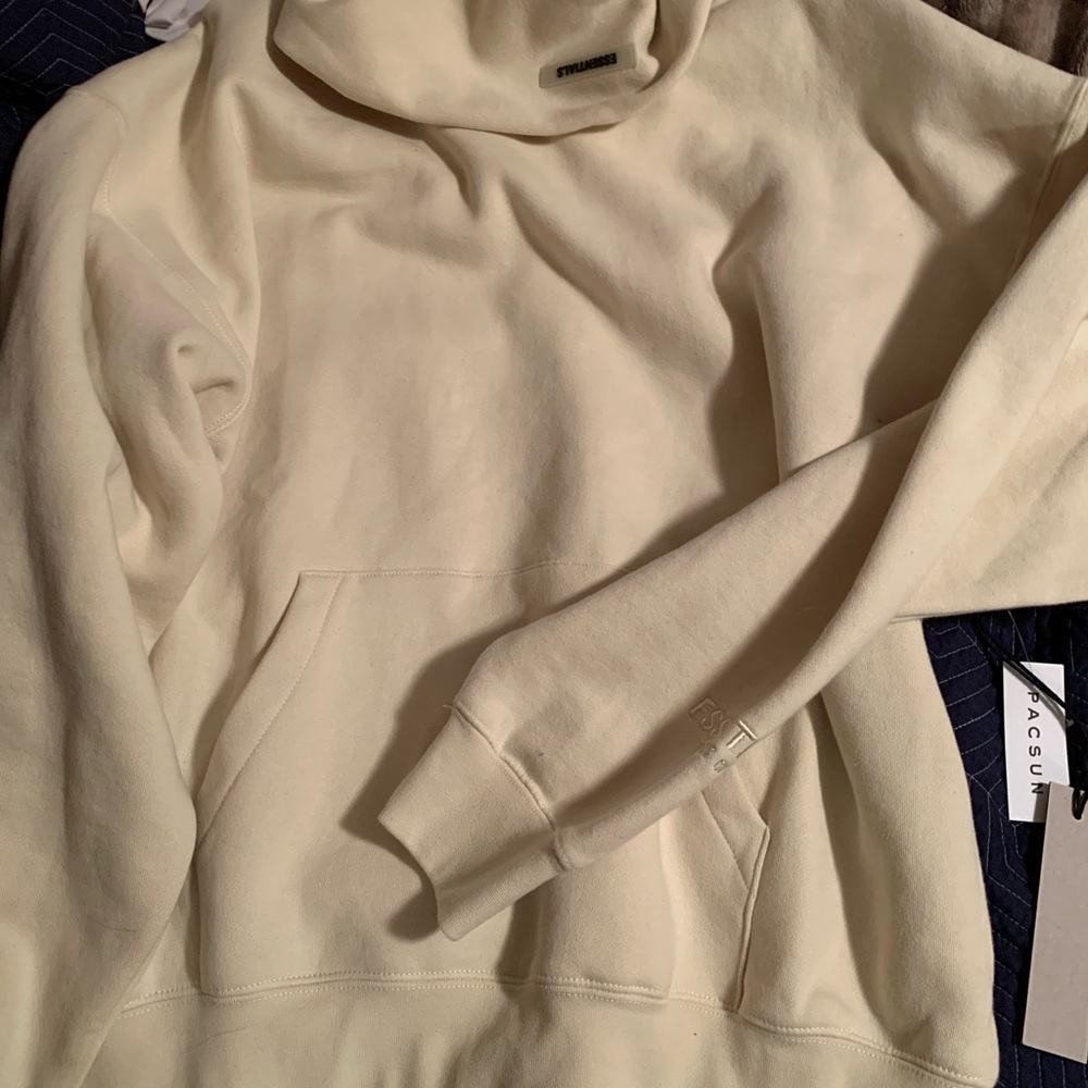 Fear of God Essentials off white hoodie